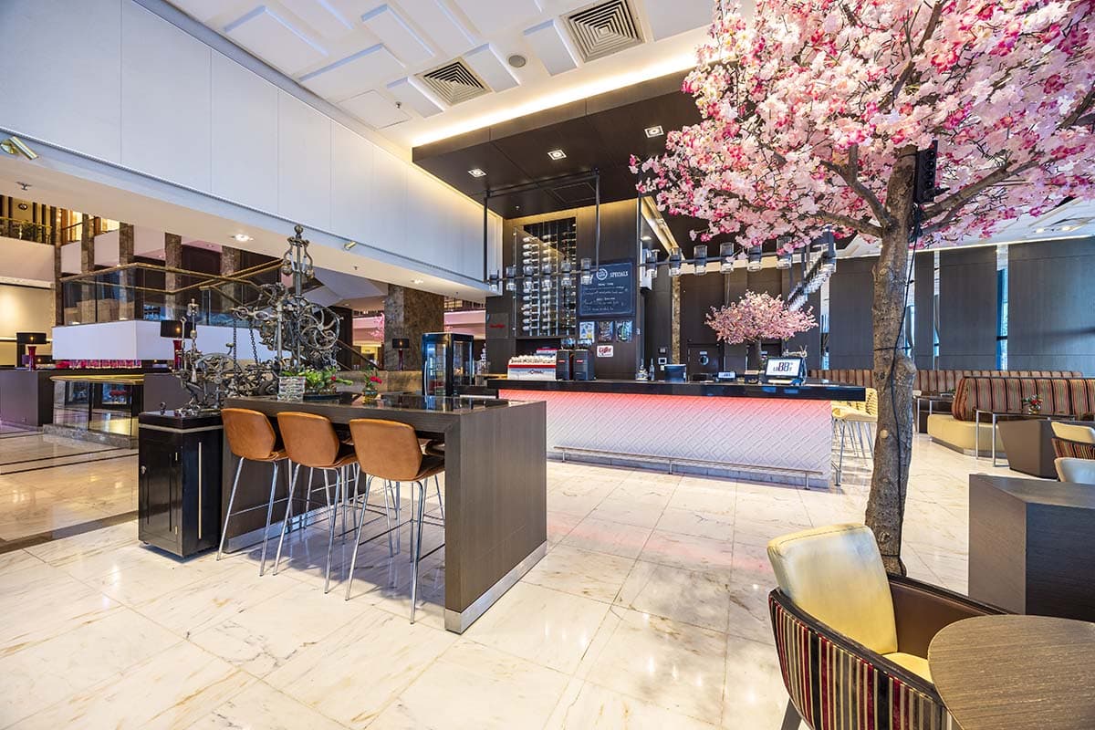 Lobby Bar · counter under the blossom tree